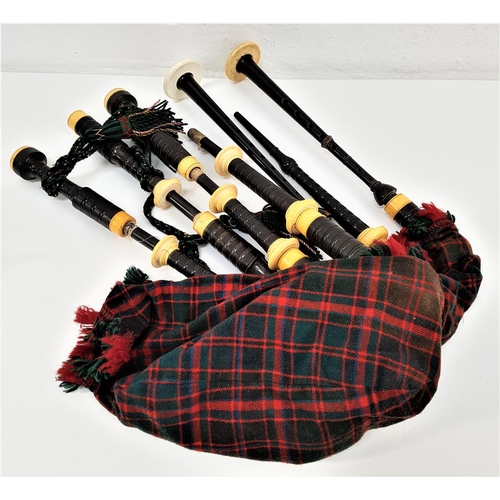 366 - SET OF 19th CENTURY DUNDEE MADE BAGPIPES
with ebony pipes and ivory mounts, one section replaced, wi...