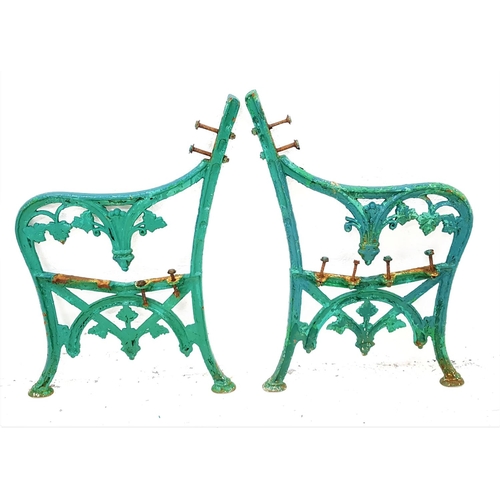 489 - PAIR OF 19th CENTURY IRON BENCH ENDS
in the Coalbrookdale style, with shaped arms and leaf decoratio... 