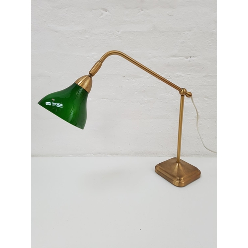 518 - BRASS DESK LAMP
raised on a square weighted base with a tubular column with adjustable arm with a gr... 