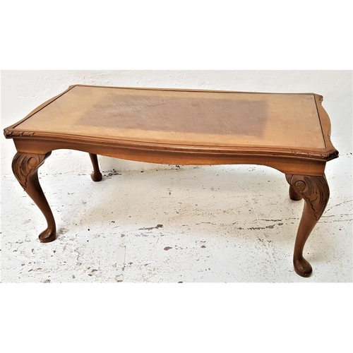 469 - WALNUT OCCASIONAL TABLE
with an inset glass top, standing on cabriole supports, 96cm wide