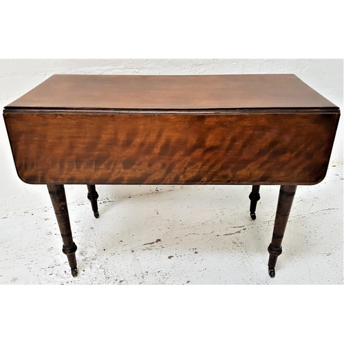 525 - EDWARDIAN MAHOGANY PEMBROKE TABLE
with shaped drop flaps and a frieze drawer, standing on ring turne... 