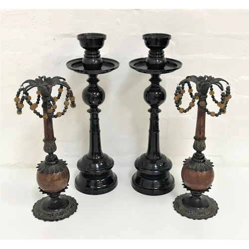 300 - PAIR OF LARGE METAL CANDLESTICKS
raised on circular bases with tapering and knopped stems, 46cm high... 