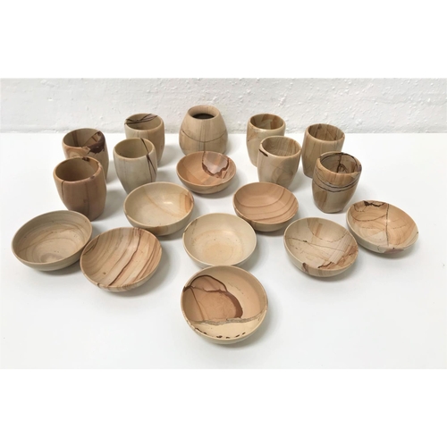 319 - SET OF EIGHT POLISHED STONE CUPS AND NINE BOWLS
all in cream and brown tones with variegated finish;... 