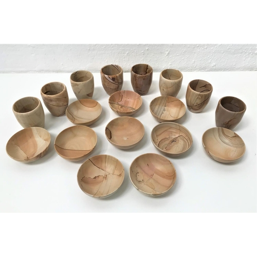 320 - SET OF EIGHT POLISHED STONE CUPS AND TEN BOWLS
all in cream and brown tones with variegated finish (... 