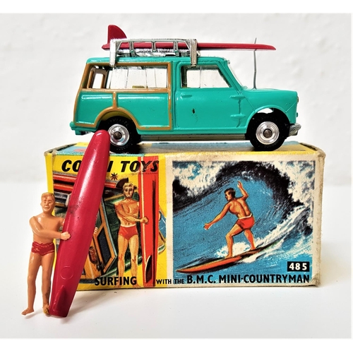 403 - VINTAGE CORGI 485 BMC MINI COUNTRYMAN SURFING
in teal with a yellow interior, two roof mounted surf ... 