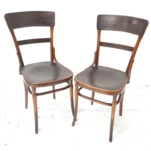 480 - PAIR OF BENTWOOD CHAIRS
with shaped backs above shaped solid seats, standing on shaped supports, bea... 