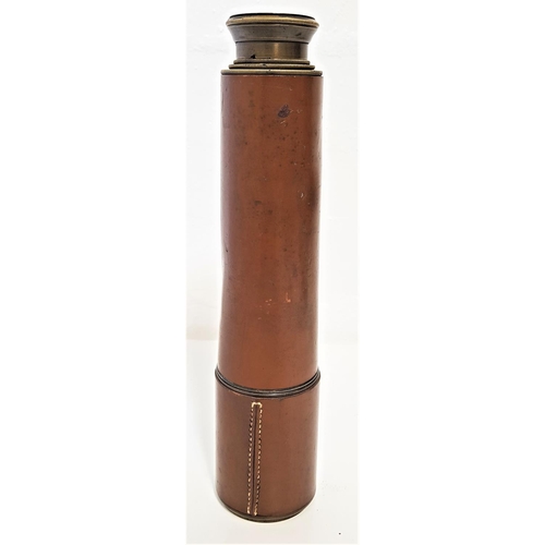 323 - FOUR DRAW BRASS TELESCOPE
with a leather bound barrel, marked W.W. Scott & Co, 5 Royal Exchange Squa... 