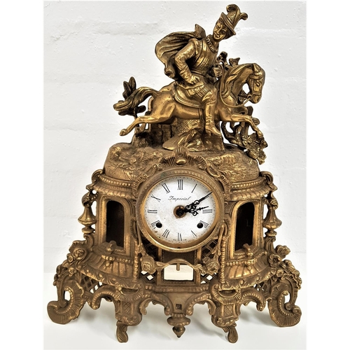 515 - MID 20th CENTURY BRASS MANTLE CLOCK
with a circular enamel dial marked Imperial, with Roman numerals... 