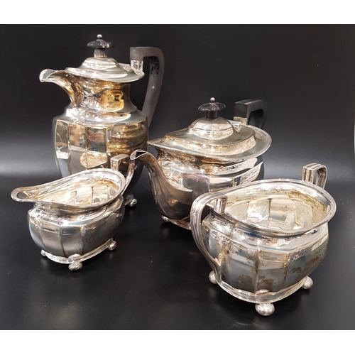 174 - GEORGE V FOUR PIECE SILVER TEA SET
of lobed form and all raised on flattened bun feet, comprising a ... 