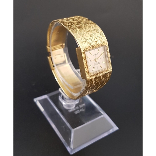 81 - LADIES EIGHTEEN CARAT GOLD 'DELANO' WRISTWATCH
the square dial with baton markers and marked 'Edward... 