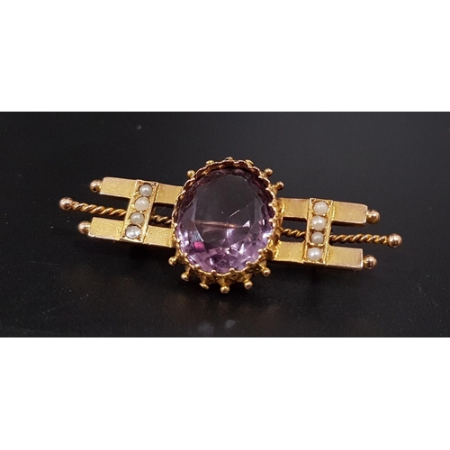 101 - EDWARDIAN AMETHYST AND SEED PEARL BROOCH
the central large oval cut amethyst measuring approximately... 