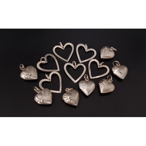 125 - SEVEN SILVER HEART SHAPED LOCKET PENDANTS
together with six further heart shaped pendants (13)