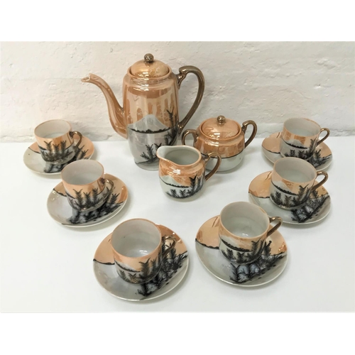 285 - JAPANESE EGGSHELL COFFEE SET
with lustre finish and hand painted Mount Fuji decoration, comprising a... 