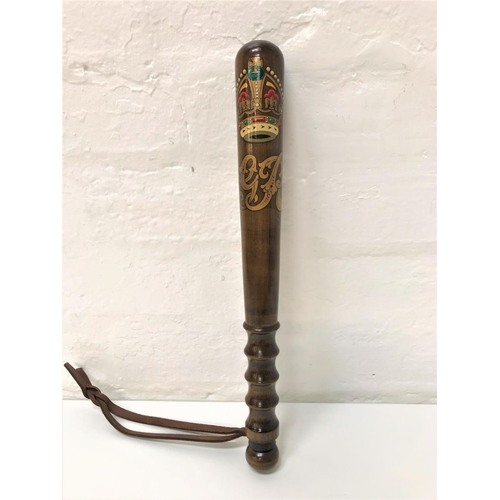 336 - GEORGE VI TRUNCHEON
with a polychrome cypher, the turned body with hand grip and leather wrist strap... 