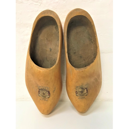 351 - PAIR OF HAND MADE VINTAGE WOODEN CLOGS
with transfer crest for Belgique 1945, approximately 31cm lon... 