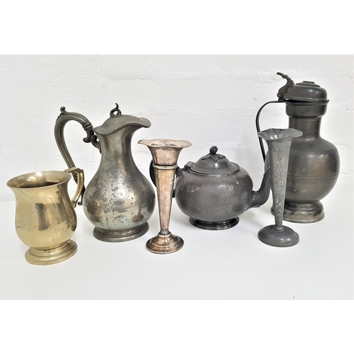 297 - SELECTION OF PEWTER WARE
including a pair of trumpet spill vases, tea pot, five tankards, milk jug a... 