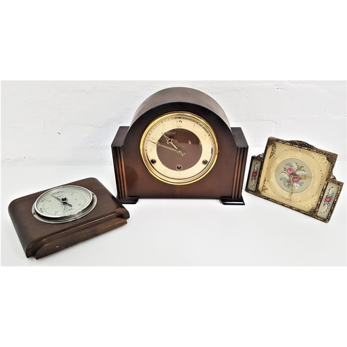 329 - WESTMINSTER CHIME MANTLE CLOCK
with an arched case and circular dial with Arabic numerals, 22cm high... 