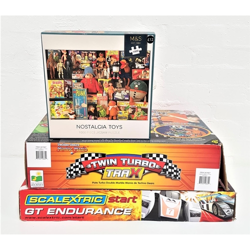 389 - SCALEXTRIC GT ENDURANCE SET
with two cars, hand held controls and track, boxed, a Marble Mania Twin ... 