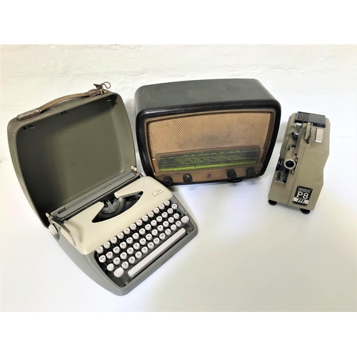 332 - ADLER TIPPA TYPEWRITER
with travel case, Phillips gramophone with a glass tuning window and a Eumig ... 