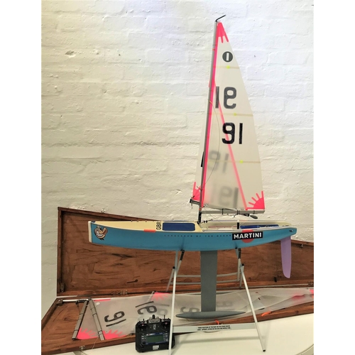 390 - LARGE RADIO CONTROLLED POND YACHT
the hull marked 'Conqueror Of The Ocean Martini', with five sails ... 