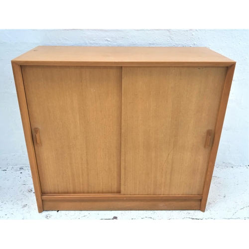 463 - LIGHT MAHOGANY BOOKCASE
with a rectangular top above a pair of sliding doors with an adjustable shel... 