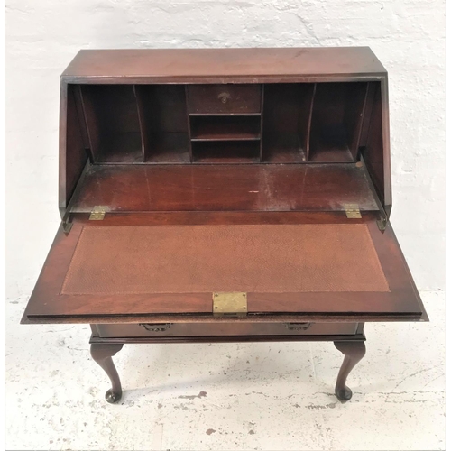 482 - MAHOGANY BUREAU
with an inset fall flap and fitted interior above three long graduated drawers, stan... 