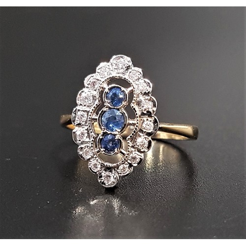 84 - SAPPHIRE AND DIAMOND PLAQUE RING
the central three vertically set sapphires in multi diamond set pie... 