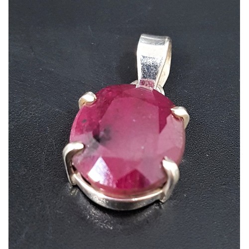 168 - RUBY SINGLE STONE PENDANT
the oval cut ruby approximately 18cts, in silver mount, approximately 3cm ... 