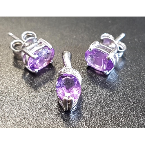 119 - AMETHYST PENDANT AND PAIR OF STUD EARRINGS
the pendant with oval cut amethyst below a small diamond,... 