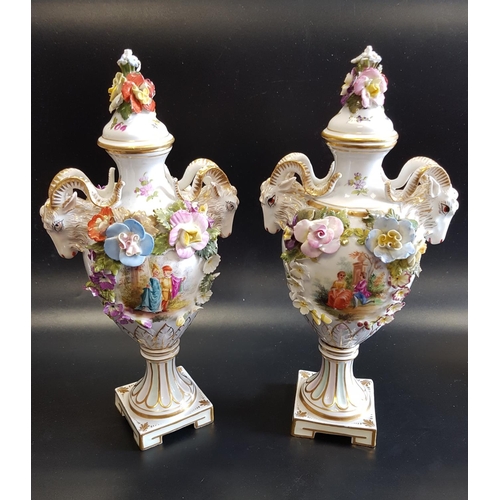 181 - PAIR OF 19th CENTURY MEISSEN URNS
the baluster bodies encrusted with flowers, the reserves painted w... 