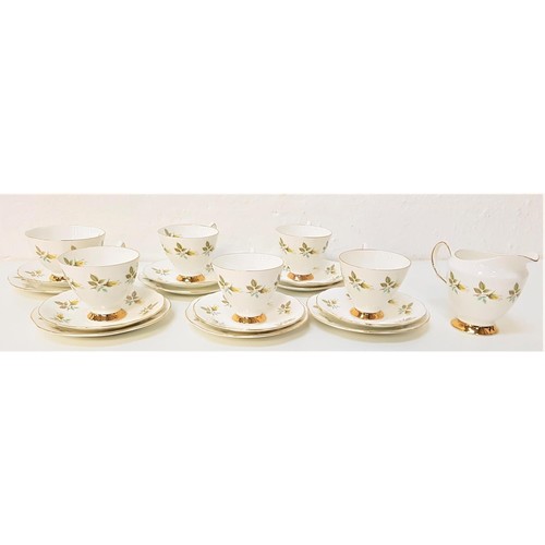 235 - TAYLOR & KENT LONGTON TEA SERVICE
with a white and pale pink ground with gilt highlights, comprising... 