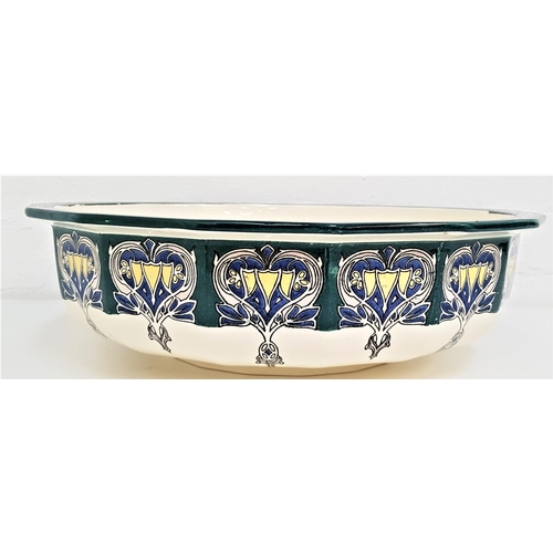 281 - LARGE RAYAL DOULTON WASH BOWL
with a stylised decorative frieze, 41cm diameter, porcelain dressing t... 