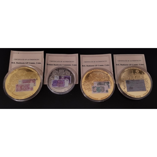 423 - FOUR BRITISH BANKNOTE GOLD PLATED COMMEMORATIVE PROOF COINS
comprising £5 white note, 10 Shilling ba... 