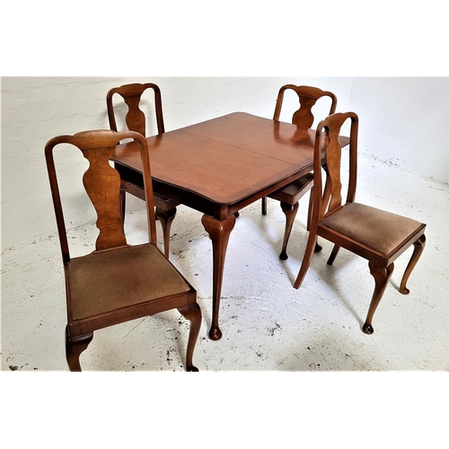 487 - BURR WALNUT AND CROSSBANDED DINING TABLE AND FOUR CHAIRS
the table with a shaped pull apart top and ... 