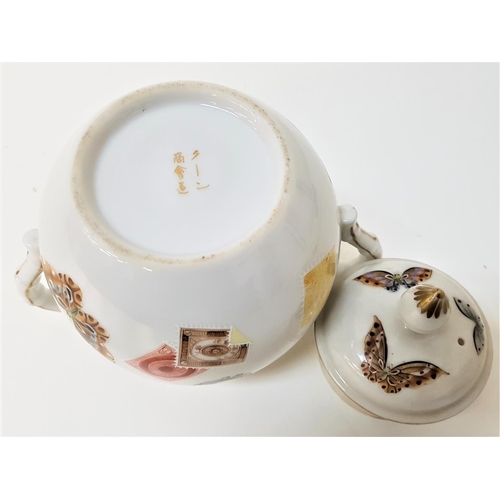 234 - JAPANESE PORCELAIN LIDDED SUGAR BOWL
with simulated bamboo handles, the lid and body decorated with ... 