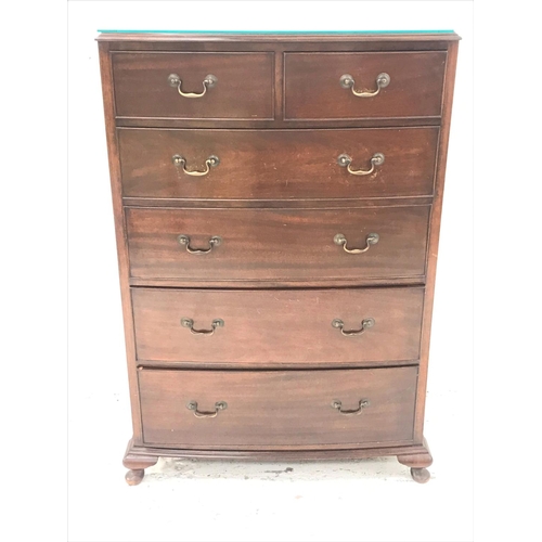 533 - MAHOGANY BOW FRONT CHEST
with a moulded top above two short cockbeaded drawers and four long cockbea... 