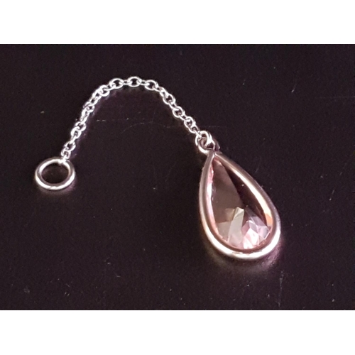 123 - MORGANITE DROP PENDANT
the pear cut pink gemstone drop in white gold bezel setting suspended below c... 