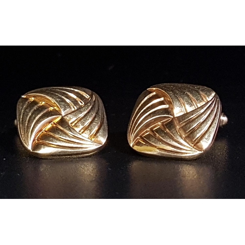 145 - PAIR OF NINE CARAT GOLD CUFFLINKS
with entwined knot style decoration, approximately 6 grams