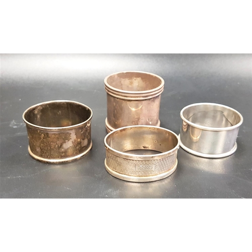 180 - THREE SILVER NAPKIN RINGS
one Birmingham 1919, the other two with indistinct Birmingham marks; toget... 