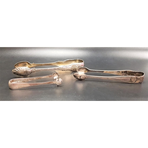 181 - THREE PAIRS OF SILVER SUGAR TONGS
the largest pair with shell and scroll detail, Glasgow 1830; anoth... 