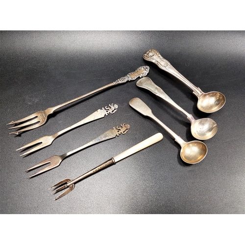 193 - THREE SILVER SALT SPOONS
all of ladle form - London 1822, indistinct maker mark, Glasgow 1835, maker... 