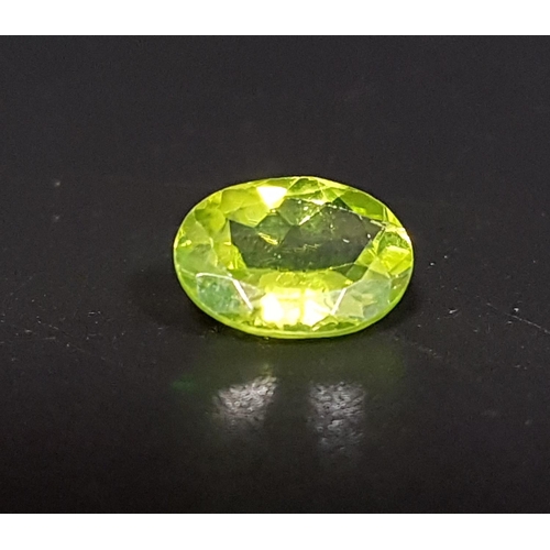 18 - CERTIFIED LOOSE NATURAL PERIDOT
the oval cut gemstone weighing 1.87cts, with ITLGR Gemstone Report