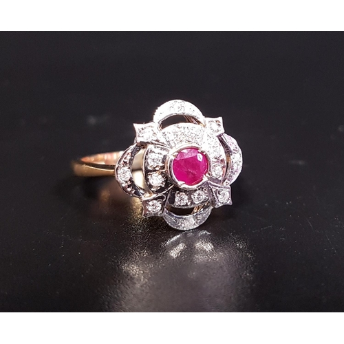 30 - ATTRACTIVE RUBY AND DIAMOND CLUSTER DRESS RING
the central ruby approximately 0.25cts in multi diamo... 