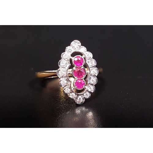50 - RUBY AND DIAMOND PLAQUE RING
the central three rubies in vertical setting totaling approximately 0.2... 