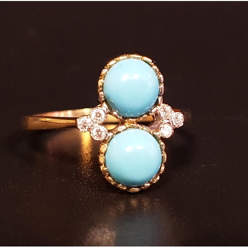 84 - TURQUOISE AND DIAMOND DRESS RING
the two round cabochon turquoise stones set in vertical orientation... 
