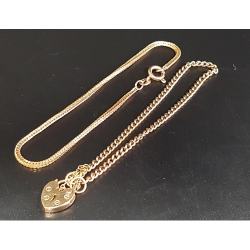 115 - NINE CARAT GOLD FIVE BAR GATE LINK BRACELET
with heart padlock clasp and safety chain, approximately... 