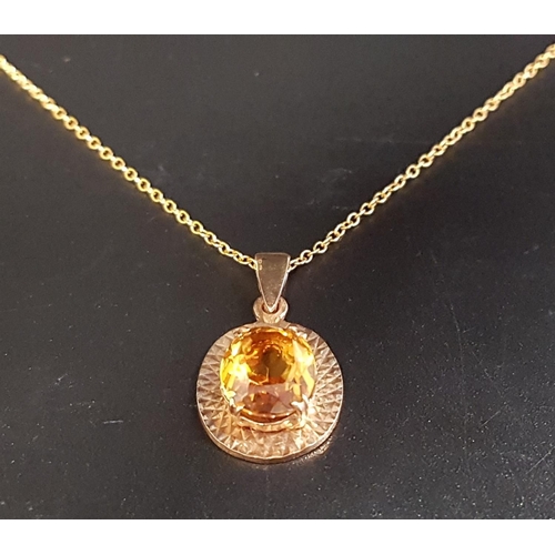 2 - CITRINE SINGLE STONE PENDANT
the oval cut citrine in nine carat gold mount and on nine carat gold ch... 