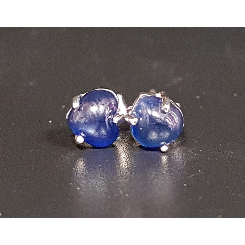 82 - PAIR OF SAPPHIRE STUD EARRINGS
the heart shaped cabochon sapphires in unmarked white gold, the butte... 
