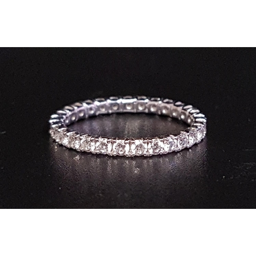 97 - DIAMOND ETERNITY RING
the twenty-nine round brilliant cut diamonds totaling approximately 0.96cts, i... 