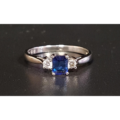 102 - FINE SAPPHIRE AND DIAMOND RING
the emerald cut sapphire approximately 0.4cts flanked by diamonds tot... 